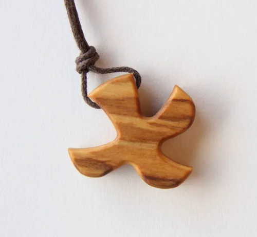 Produkt Kreuz („Taube“) - Anhänger aus Olivenholz mit Kordel Foto